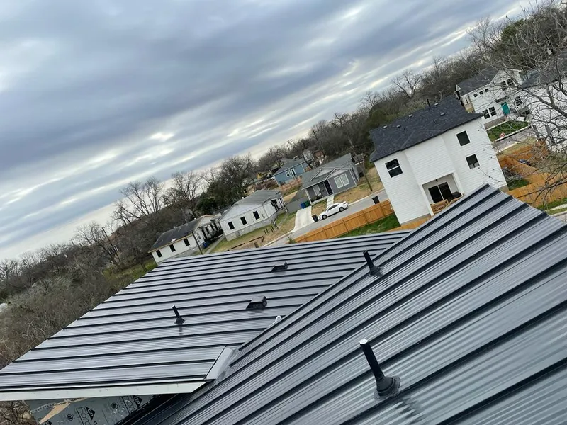 Standing seam metal roof panels with vents for Skylight Repair in Villa Park